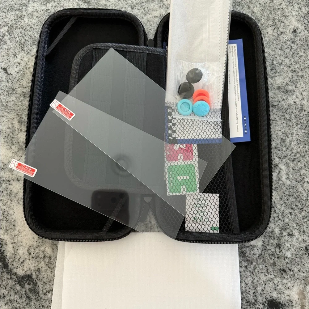 Black Carry Case for Nintendo Switch with Accessories and screen protectors